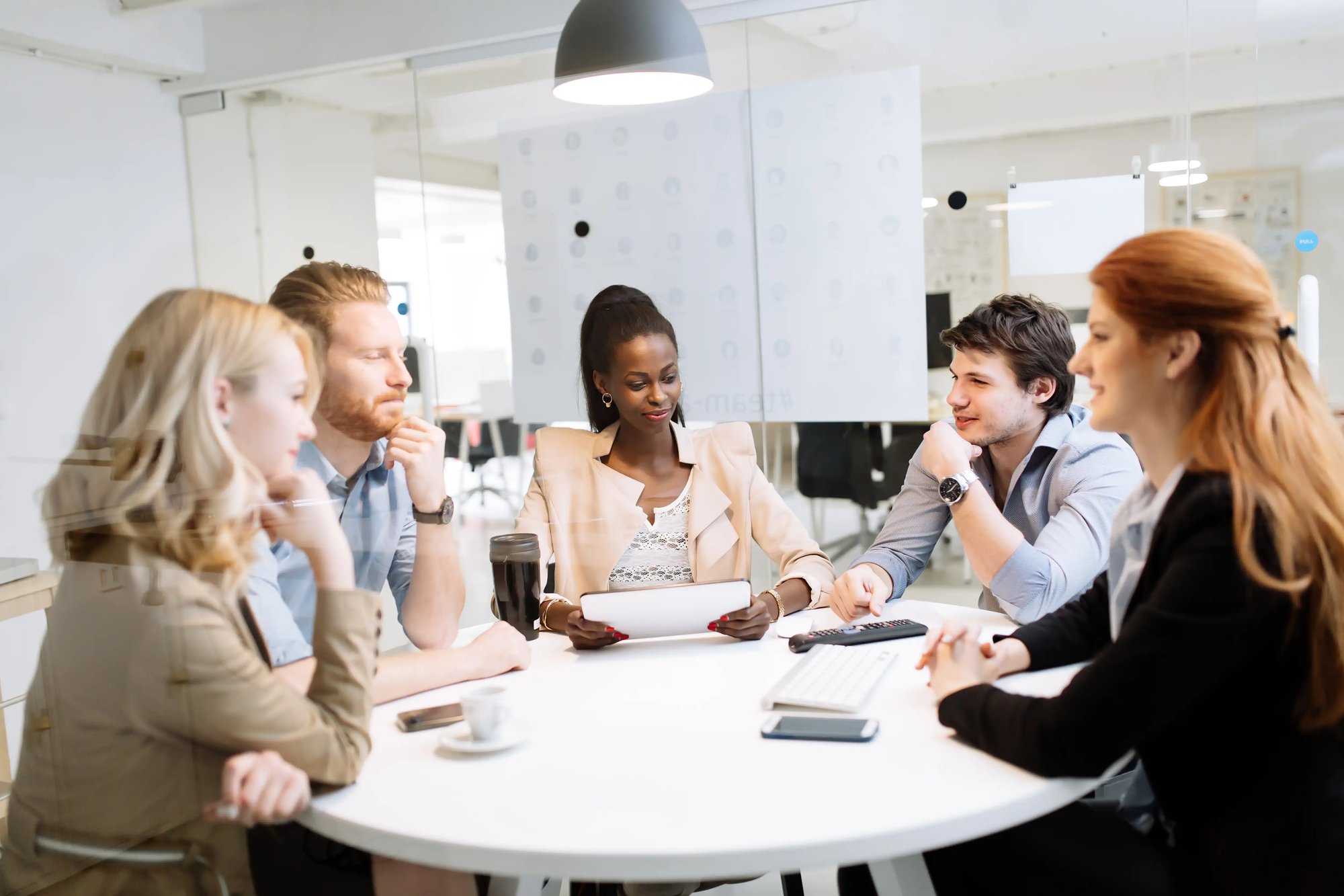 group-of-business-people-sitting-at-desk-2025-03-16-21-51-25-utc