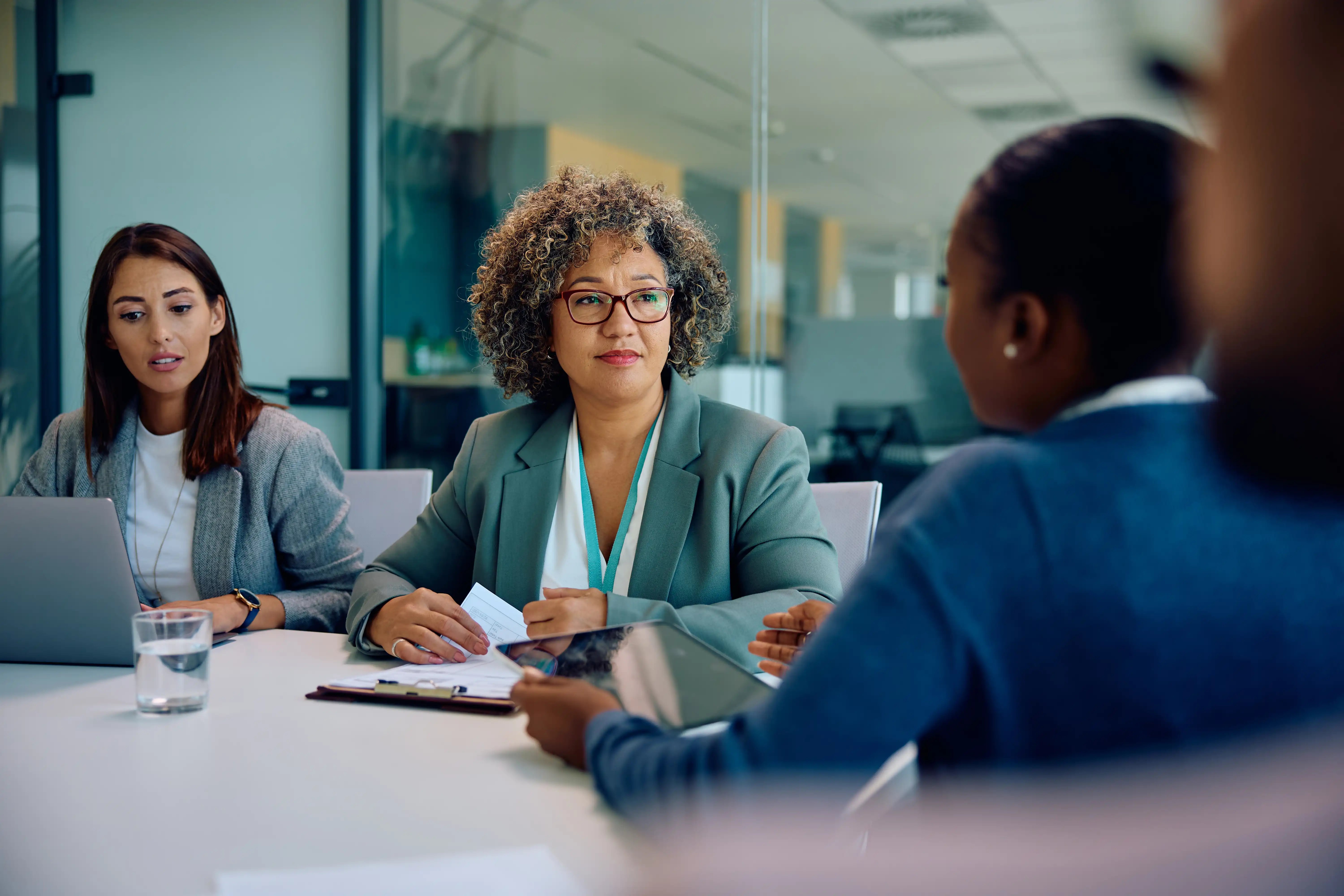 mature-ceo-having-a-meeting-with-her-business-team-2026-01-06-10-28-41-utc