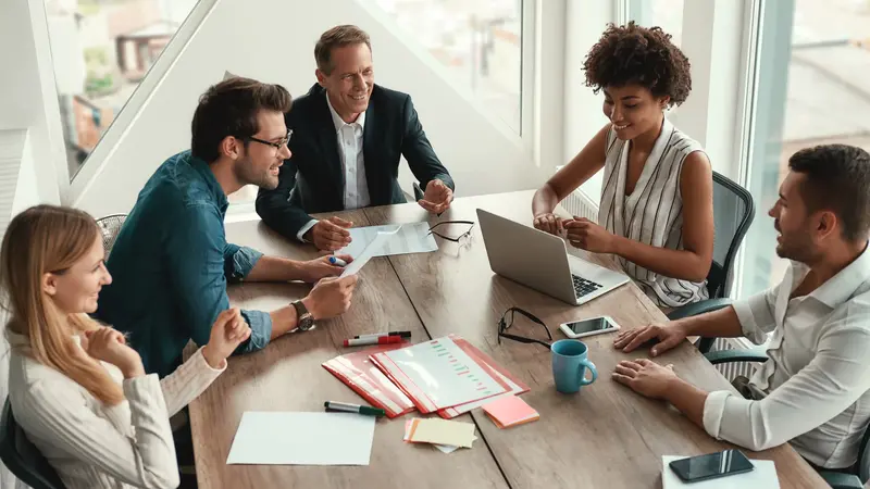 professionals-collaborating-around-a-conference-ta-2026-03-24-23-39-28-utc