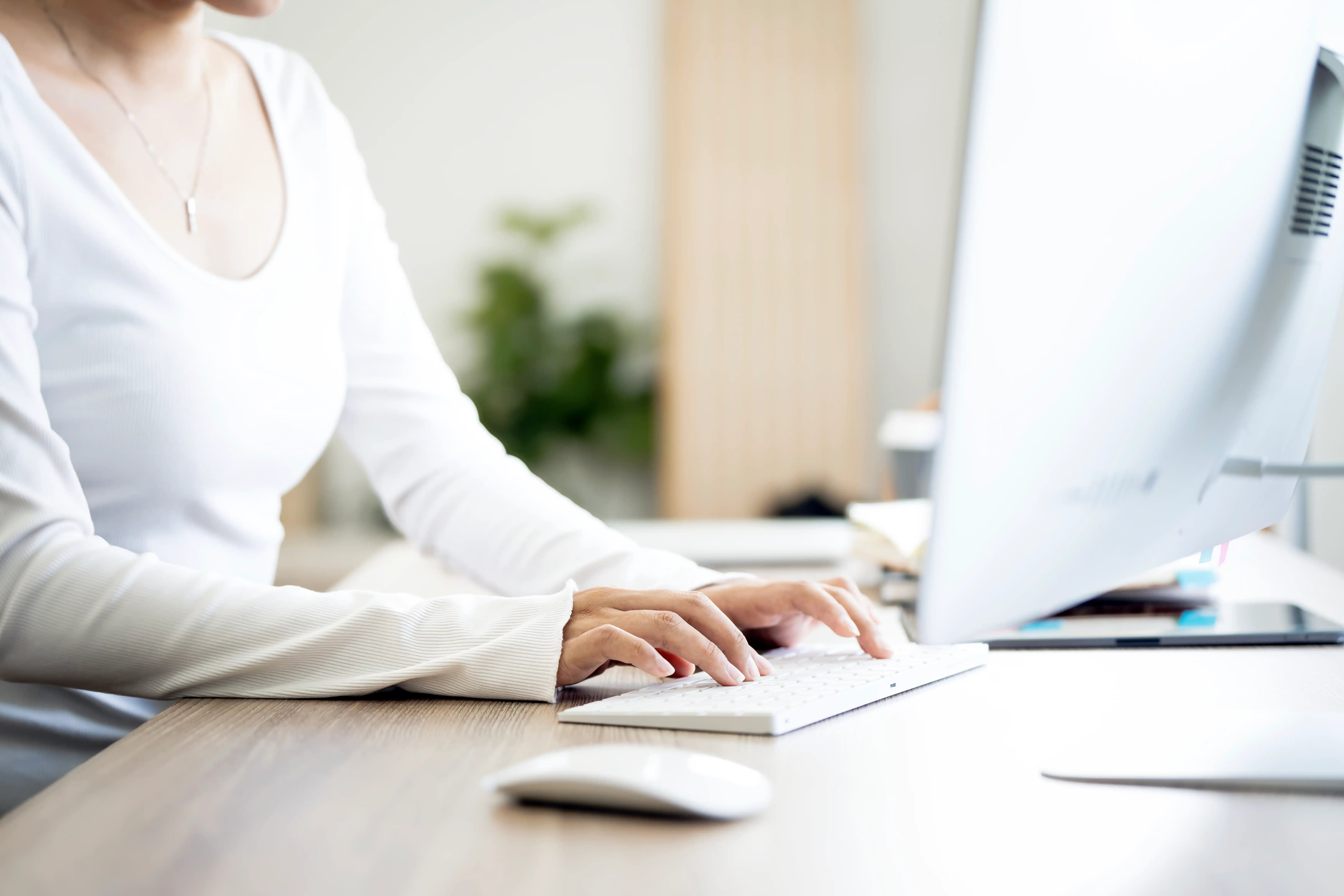 woman-typing-at-desk-working-on-computer-2026-09-21-13-13-44-utc